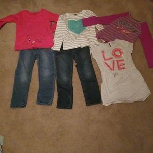 2 tops, 1 sweater, 2 pair jeggings, 1 dress